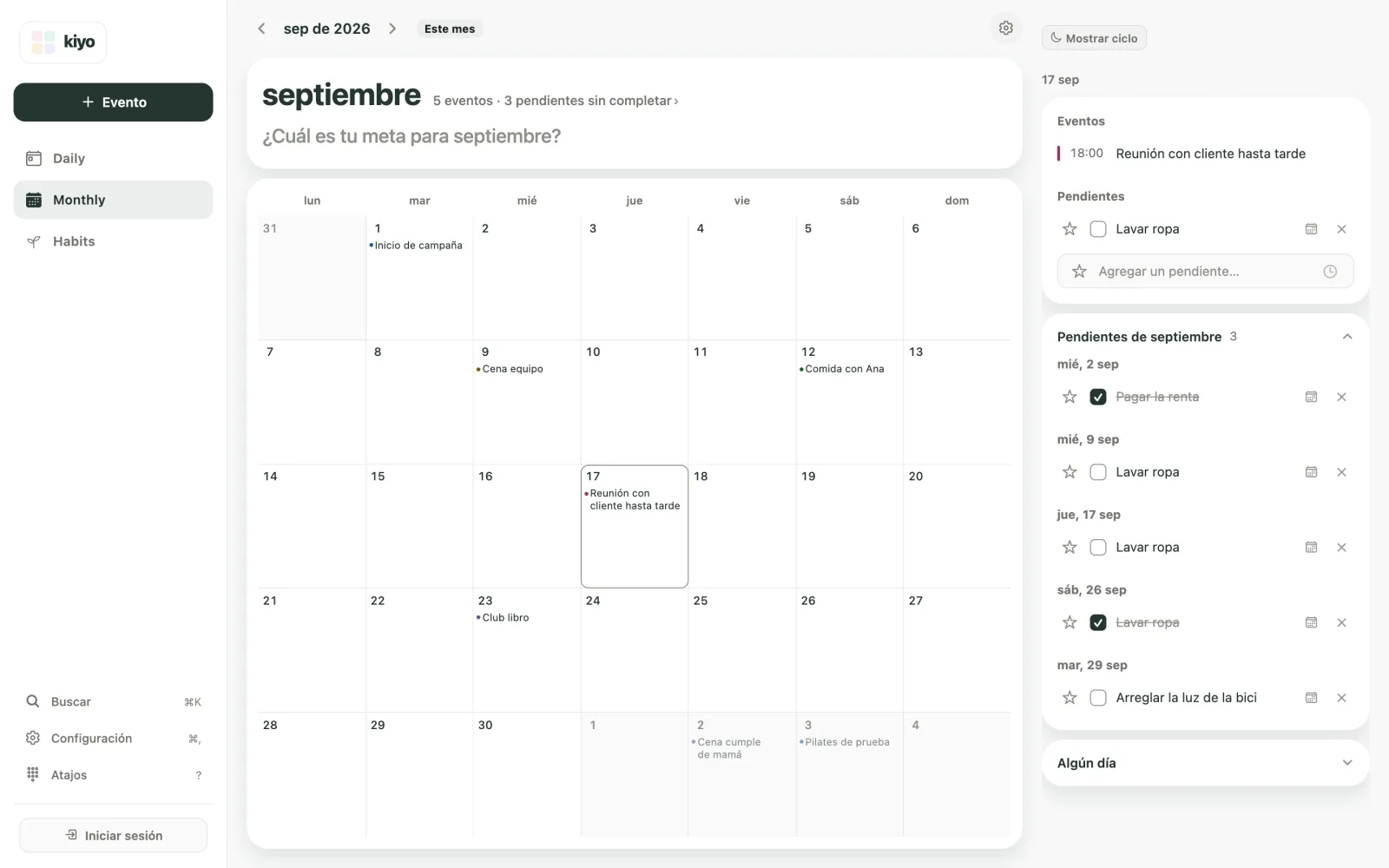 Monthly de Kiyo en la web: septiembre de 2026, con el 17 seleccionado, Reunión con cliente hasta tarde a las 18:00 y Lavar ropa sin completar; la lista mensual muestra ese pendiente los días 9, 17 y 26.