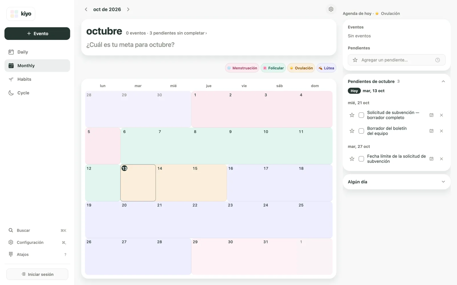 Monthly de octubre de 2026 en Kiyo, con colores del ciclo detrás del calendario y pendientes al lado: Solicitud de subvención — borrador completo y Borrador del boletín del equipo el 21 de octubre; Fecha límite de la solicitud de subvención el 27.